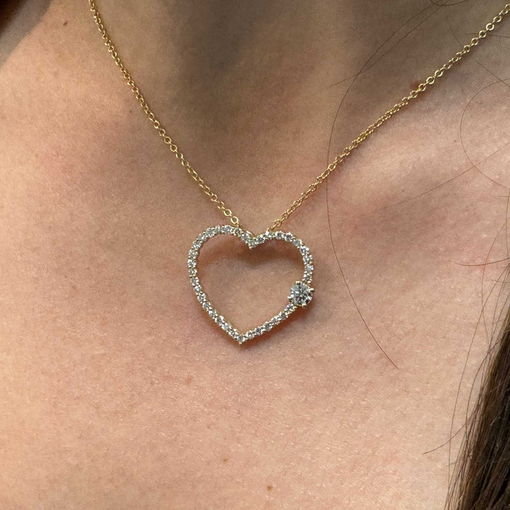 Open Diamond Heart-Shaped Pendant with one Larger Diamond
