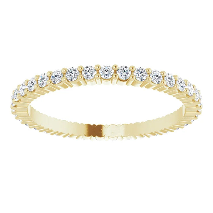 image of 14K yellow lab-grown diamond eternity wedding band set with common prongs