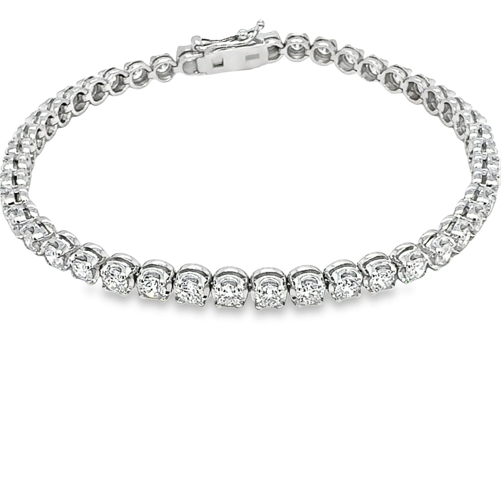 14KW tennis bracelet in Buttercup setting with 3 3/4CT diamonds