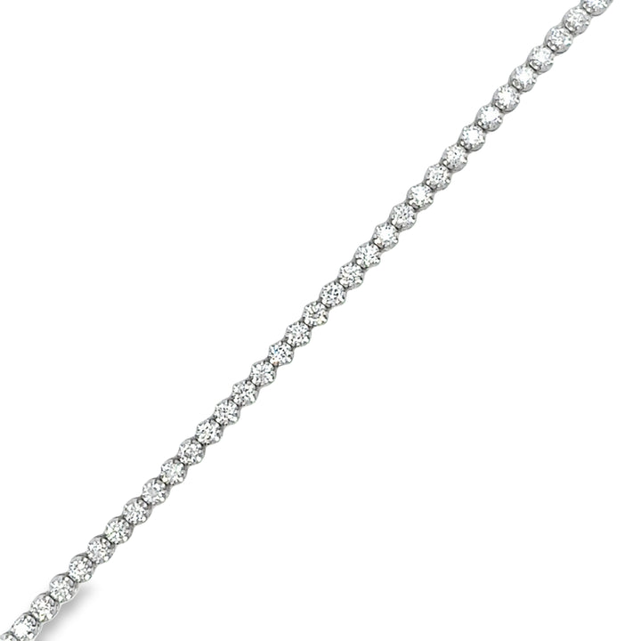 14KW tennis bracelet in Buttercup setting with 3 3/4CT diamonds