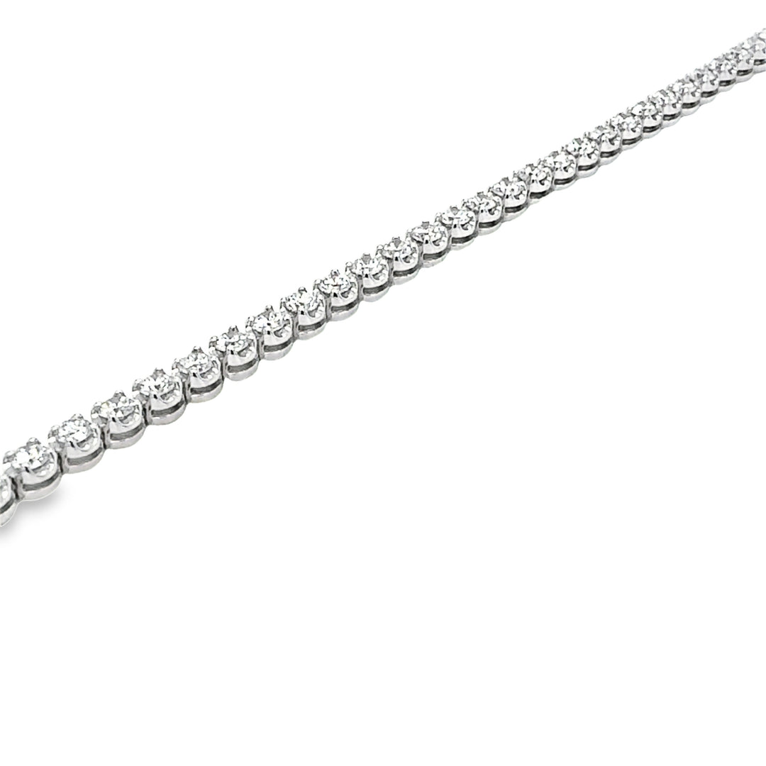 14KW tennis bracelet in Buttercup setting with 3 3/4CT diamonds