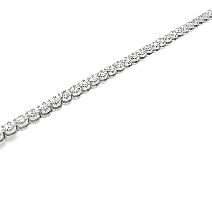 14KW tennis bracelet in Buttercup setting with 3 3/4CT diamonds