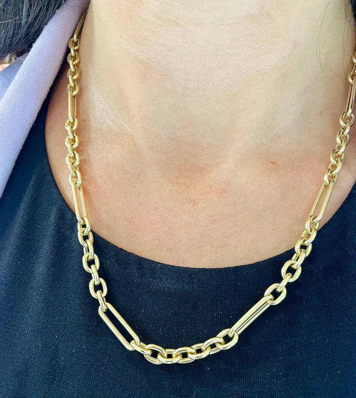 Paris Jewelers 14K Yellow Gold Alternating Link Chain Necklace on a neck