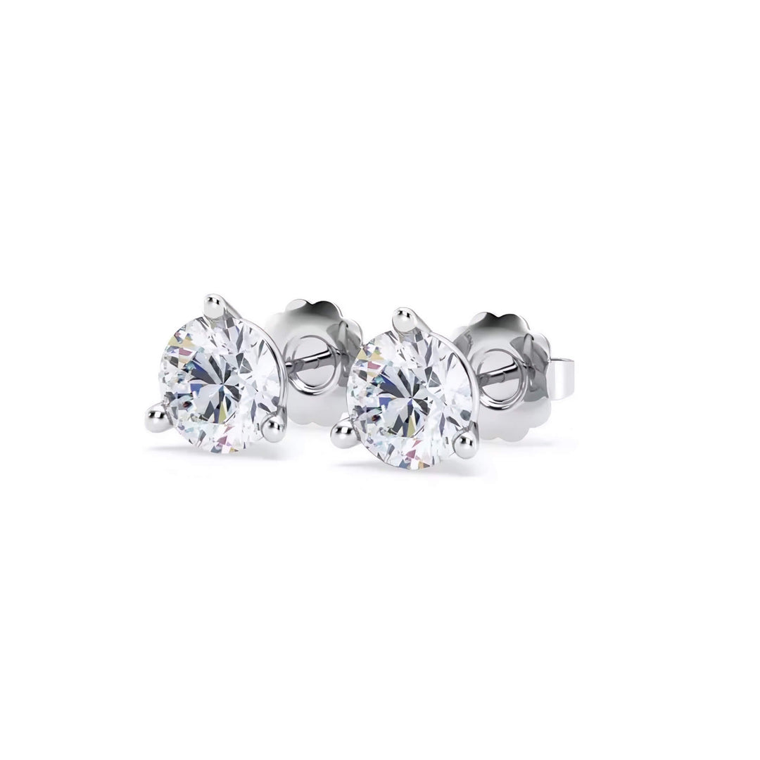 Lab-grown diamond martini (3-prong) stud earrings, 2 ctw, 14K white gold, angle view.