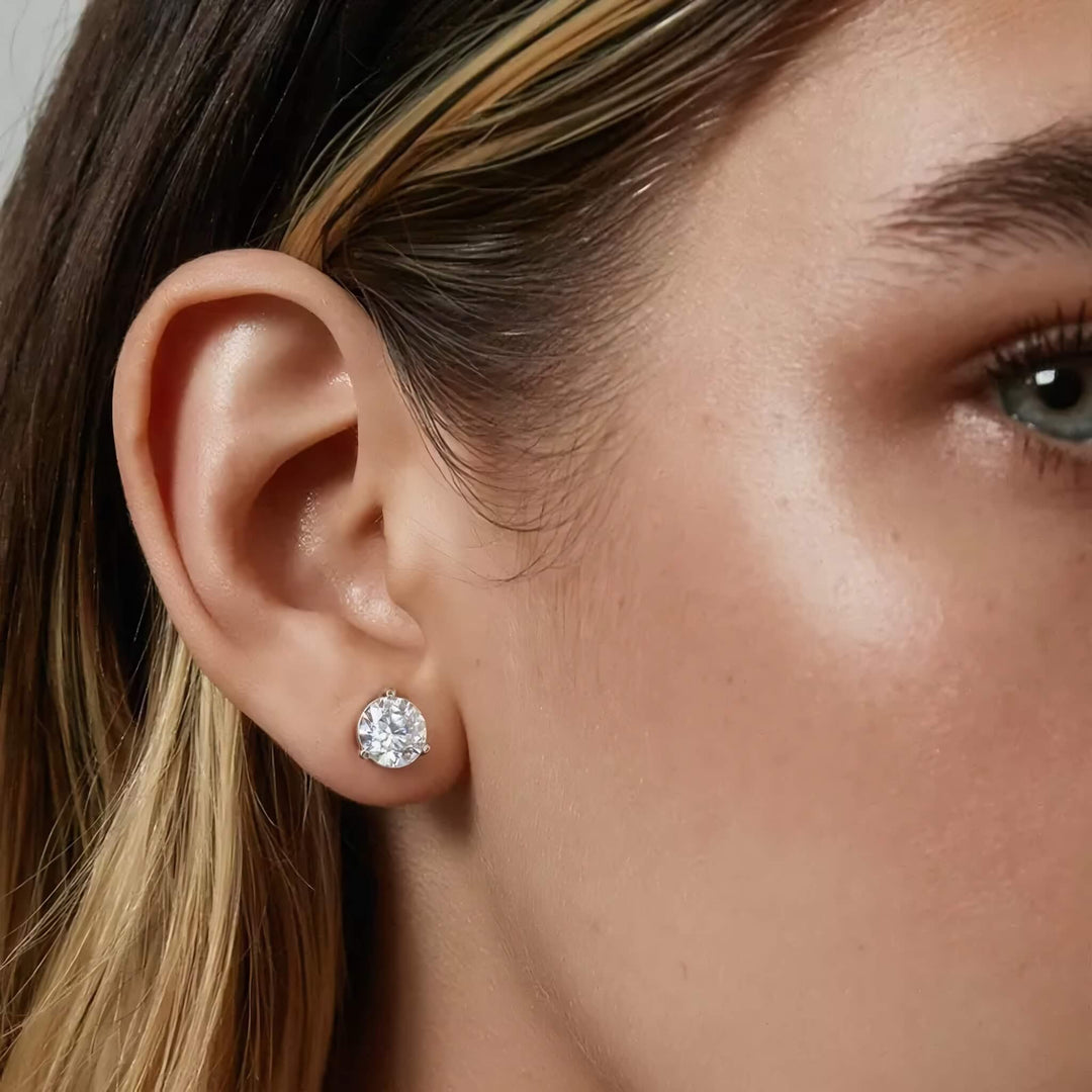 Lab-grown diamond martini (3-prong) stud earrings, 3 ctw, 14K white gold, on ear.