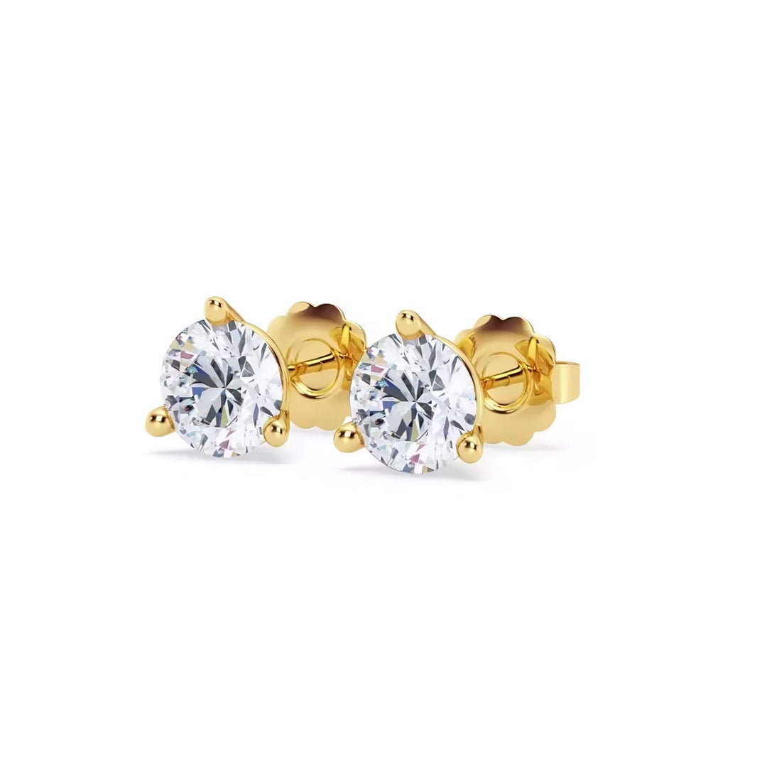 Lab-grown diamond martini (3-prong) stud earrings, 2 ctw, 14K yellow gold, angle view.