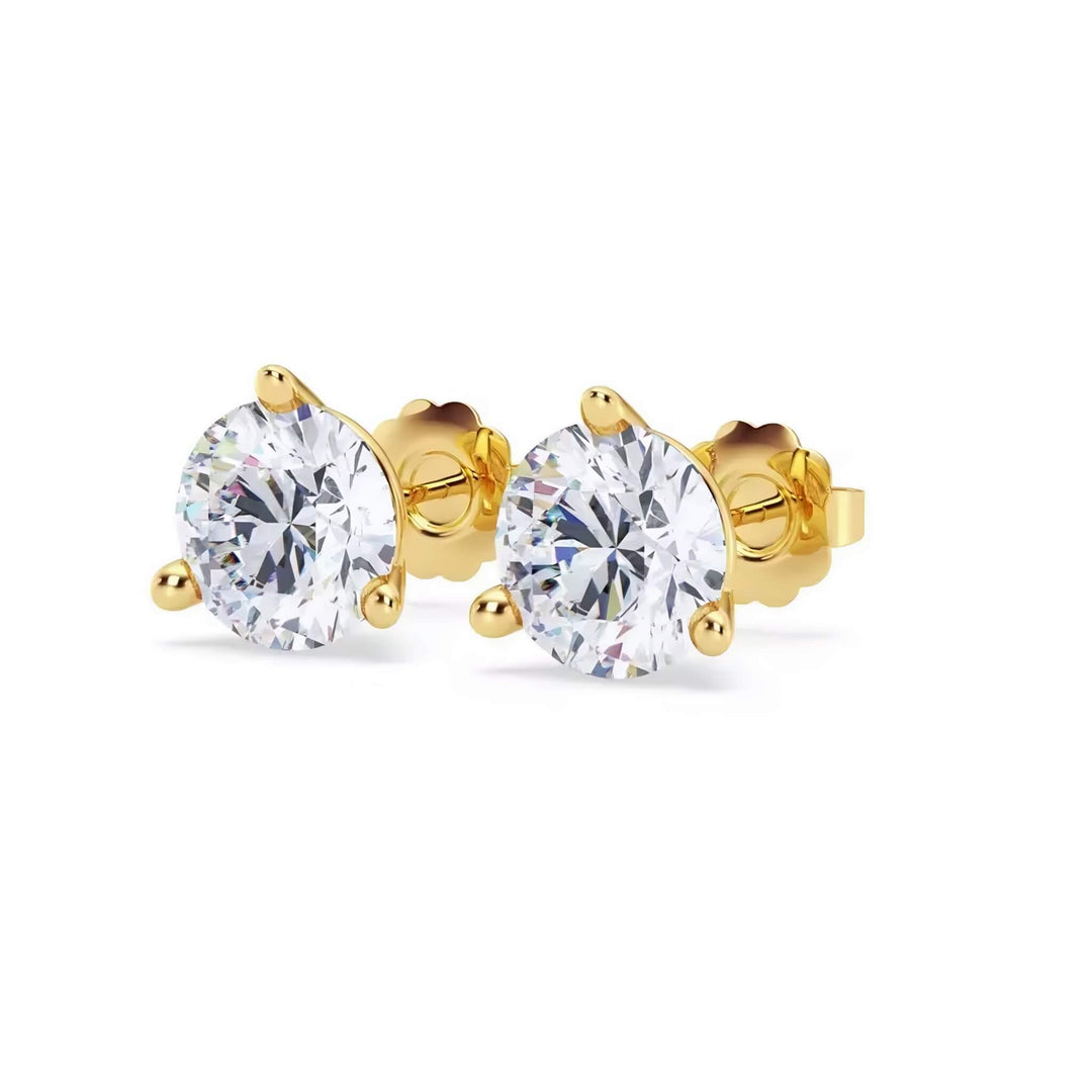 Lab-grown diamond martini (3-prong) stud earrings, 6 ctw, 14K yellow gold, angle view.
