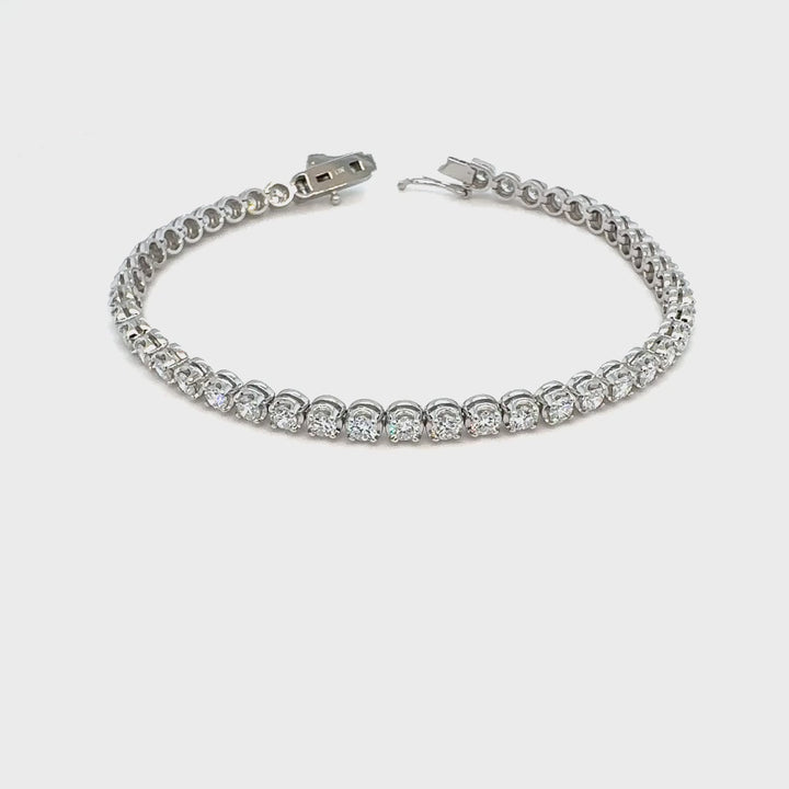 14KW tennis bracelet in Buttercup setting with 3 3/4CT diamonds